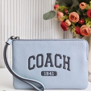 Coach Corner Zip Wristlet with Varsity/cornflower blue refined pebble leather😍